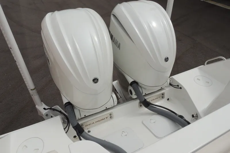 Slide: The Image of Twin Yamaha outboard engines on a 2025 Sea Hunt Gamefish 28 boat. - 19