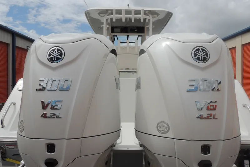 Slide: The Image of 2025 Sea Hunt Gamefish 28 with dual Yamaha 300 V6 4.2L outboard engines. - 14