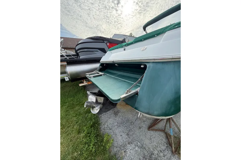 Slide: The Image of 1996 Cobalt 272 boat rear view with propeller and swim platform. - 37