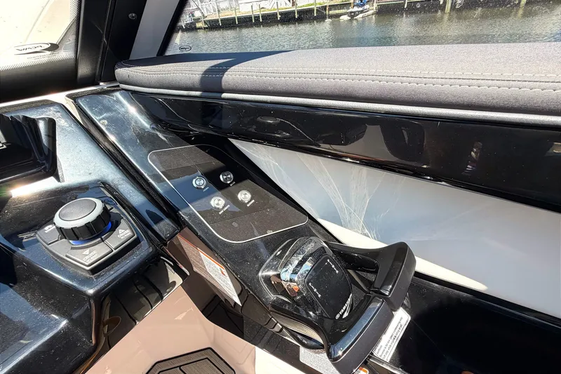 Slide: The Image of 2023 Yamaha Boats 275SE control panel with sleek design and advanced features. - 15