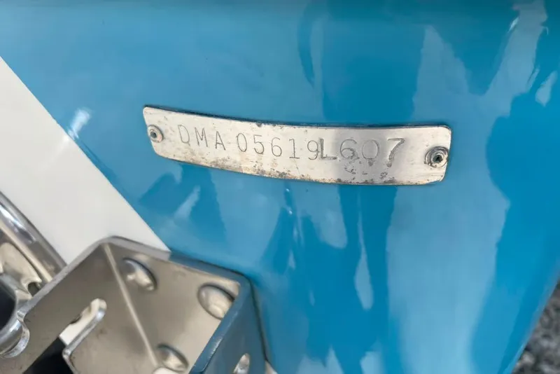 Slide: The Image of Close-up of a 2007 Edgewater 245CC boat's identification plate, displaying serial number. - 28