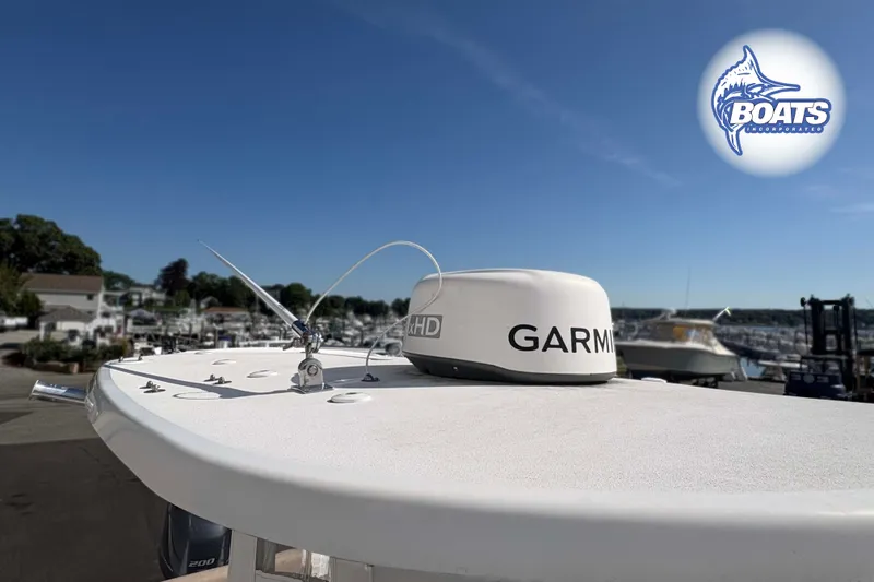 Slide: The Image of 2019 Sportsman Open 232 Center Console with Garmin radar at marina. - 7