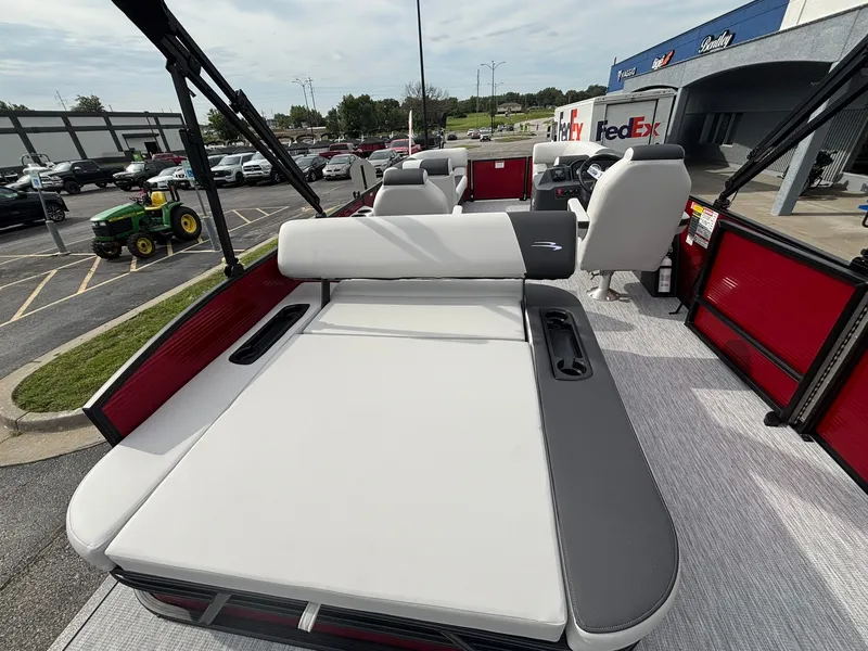 Slide: The Image of The image shows the deck of a Bennington 21 S1SB SPS boat with gray and red accents. - 29
