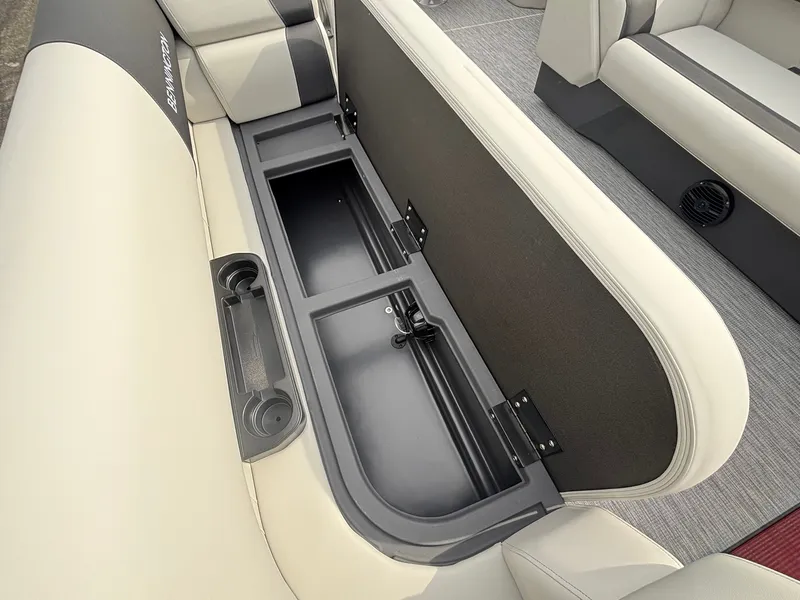 Slide: The Image of The seating area of a 2027 Bennington 21 S1SB SPS with built-in storage. - 14