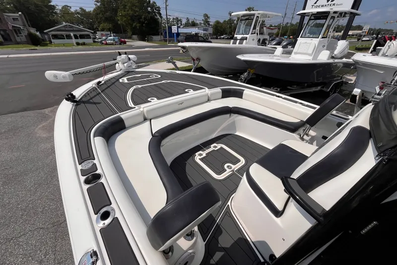 Slide: The Image of 2022 Tidewater 2500 Carolina Bay boat with sleek seating and modern design on display. - 14