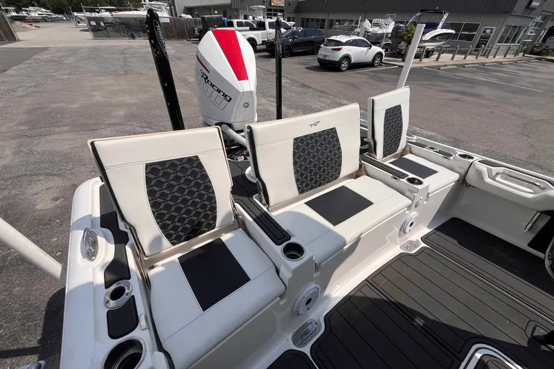 Slide: The Image of 2022 Tidewater 2500 Carolina Bay boat interior with stylish seating and modern design. - 5