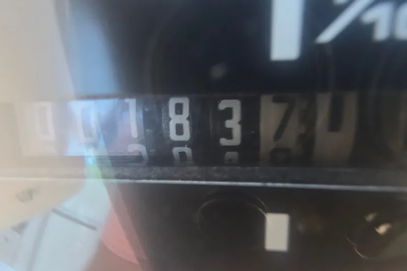 Slide: The Image of Close-up of a 2001 Monterey 322 Cruiser odometer reading 1837 hours. - 13