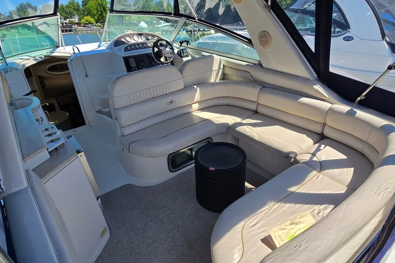 Slide: The Image of Luxurious interior of a 2001 Monterey 322 Cruiser with plush seating and modern dashboard. - 7