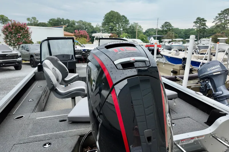 Slide: The Image of 2023 Starcraft Delta 188 DC Pro boat with Mercury 115 Pro XS engine at a marina. - 8