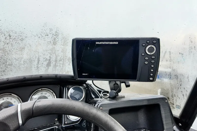 Slide: The Image of Dashboard of 2023 Starcraft Delta 188 DC Pro with Humminbird Helix 7 fish finder. - 5
