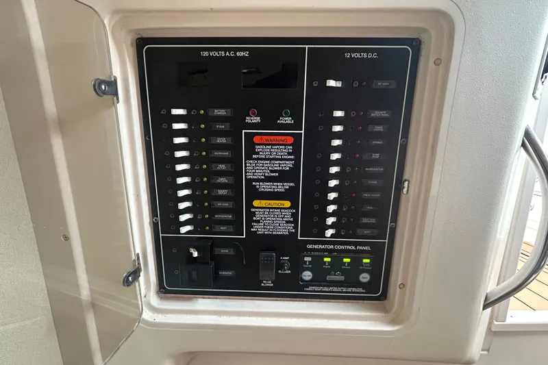 Slide: The Image of Electrical control panel on a 2005 Grady-White Express 330 boat. - 29