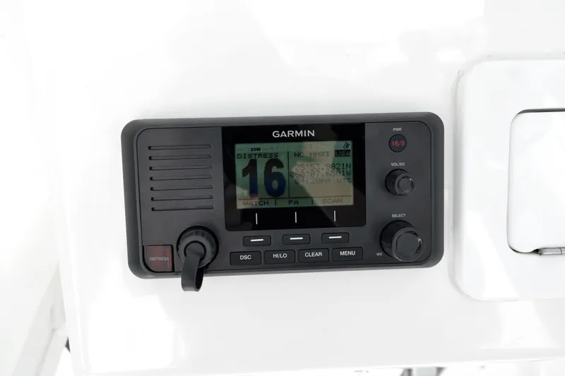 Slide: The Image of Garmin marine radio on 2023 Regulator 28 Forward Seating boat dashboard. - 24