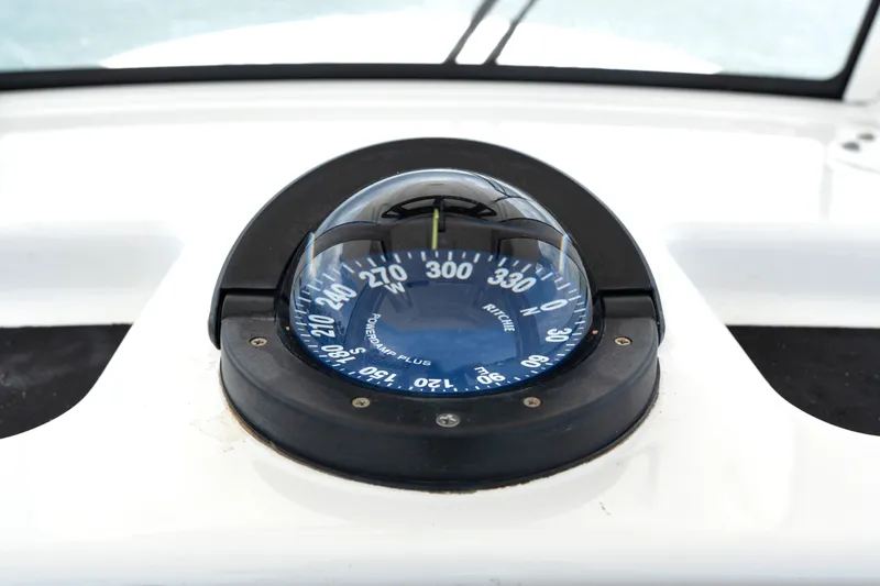 Slide: The Image of Compass on 2023 Regulator 28 Forward Seating boat dashboard. - 26