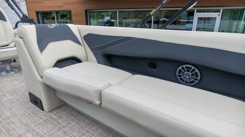 Slide: The Image of The image shows a luxurious boat seat with gray and cream upholstery. - 17