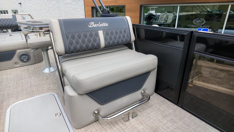 Slide: The Image of The 2027 Barletta Lusso 25UE features a luxurious gray bench seat with a quilted pattern. - 20