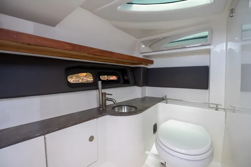 Slide: The Image of Luxurious bathroom interior of 2017 Sea Ray SLX 350 boat with modern fixtures. - 29