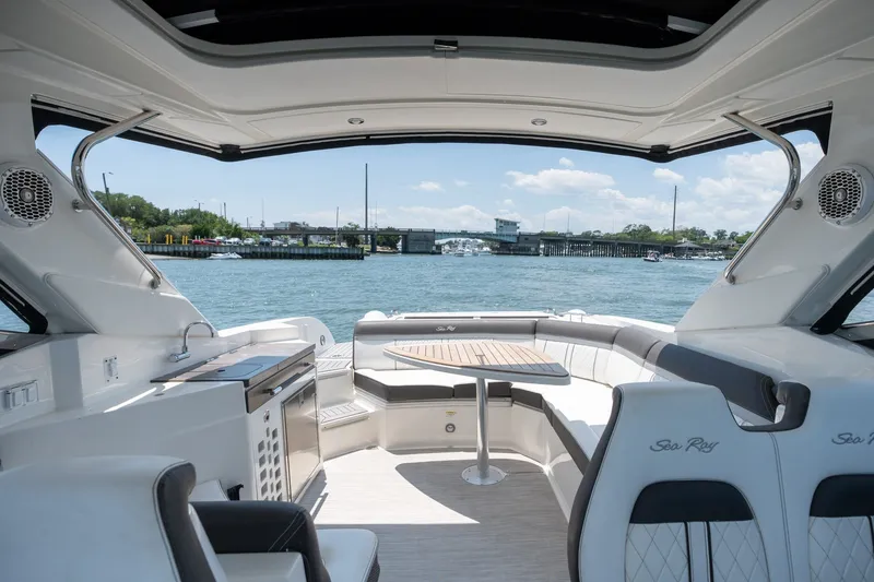 Slide: The Image of Luxurious 2017 Sea Ray SLX 350 boat interior with waterfront view. - 33