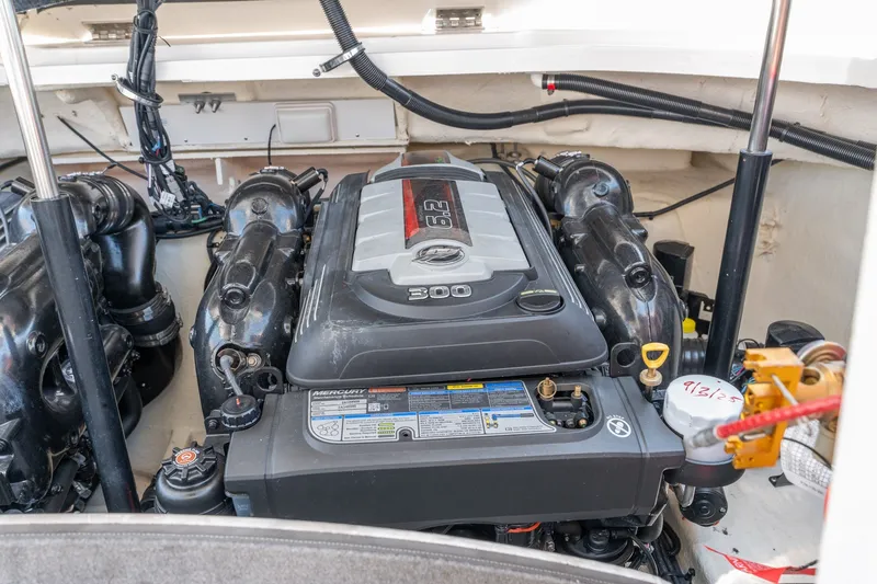 Slide: The Image of Engine compartment of a 2017 Sea Ray SLX 350 boat, featuring a Mercury engine. - 43