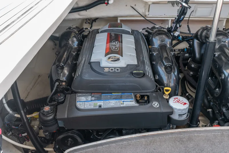 Slide: The Image of Engine compartment of a 2017 Sea Ray SLX 350 boat, featuring a Mercury 6.2L engine. - 42