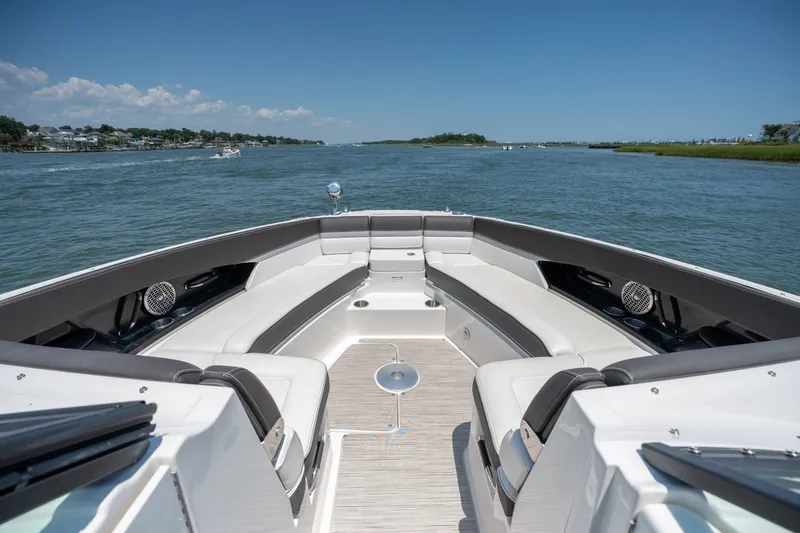 Slide: The Image of Bow view of 2017 Sea Ray SLX 350 boat on calm water. - 11