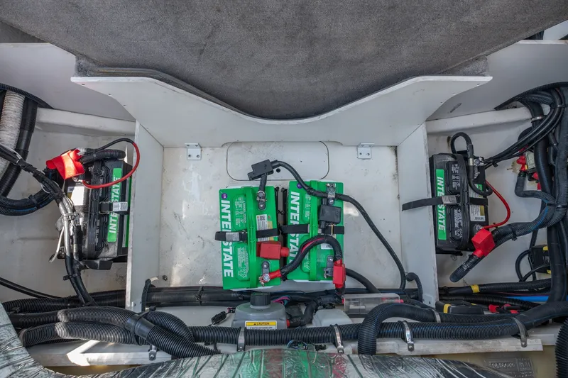 Slide: The Image of Battery compartment of a 2017 Sea Ray SLX 350 boat with Interstate batteries. - 44
