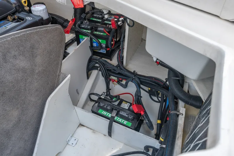 Slide: The Image of Battery compartment of a 2017 Sea Ray SLX 350 boat, featuring Interstate batteries. - 45