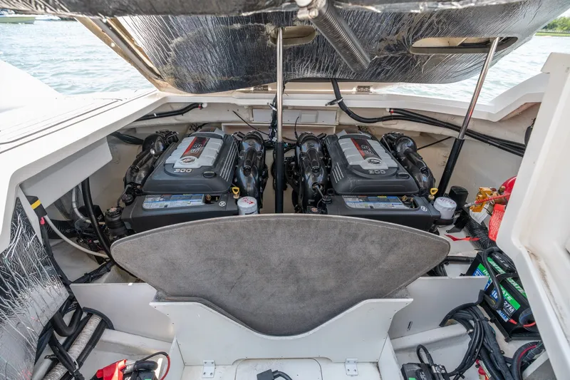 Slide: The Image of Engine compartment of a 2017 Sea Ray SLX 350 boat, showcasing dual engines. - 41