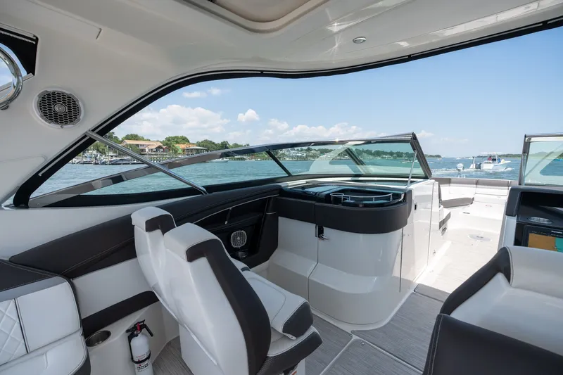 Slide: The Image of Interior view of 2017 Sea Ray SLX 350 boat, featuring sleek seating and modern design. - 18