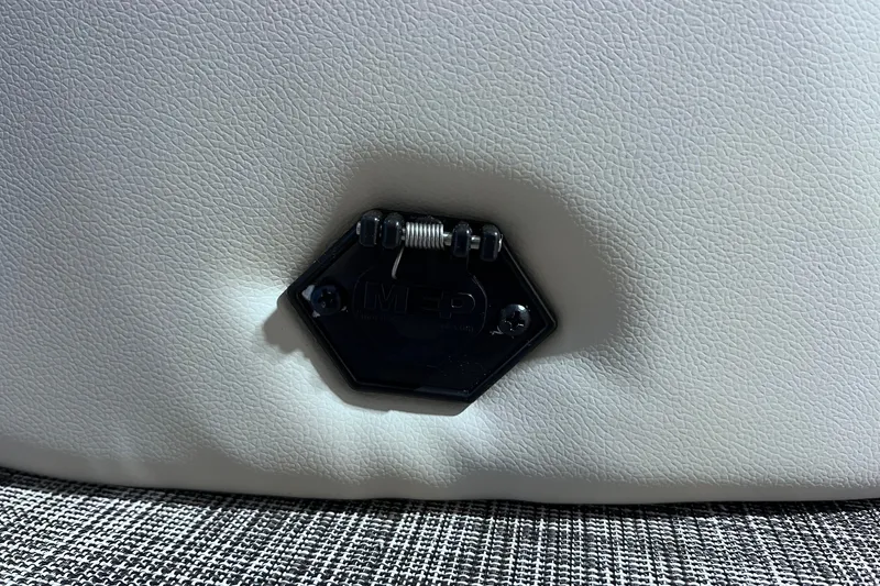 Slide: The Image of Hexagonal metal latch on SunCatcher Select 20F 2026 model, textured white surface. - 13