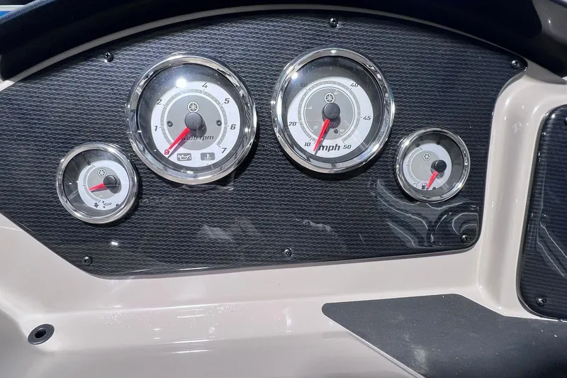 Slide: The Image of Dashboard of 2026 SunCatcher Select 20F boat with speedometer and gauges. - 23