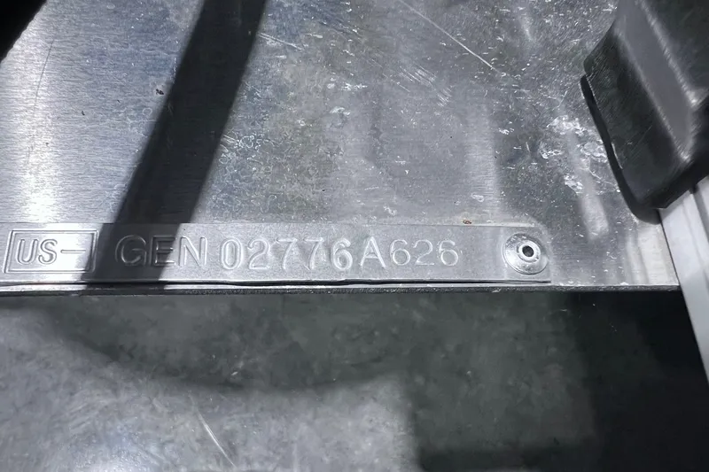 Slide: The Image of Metallic serial number plate on SunCatcher Select 20F, 2026 model. - 35