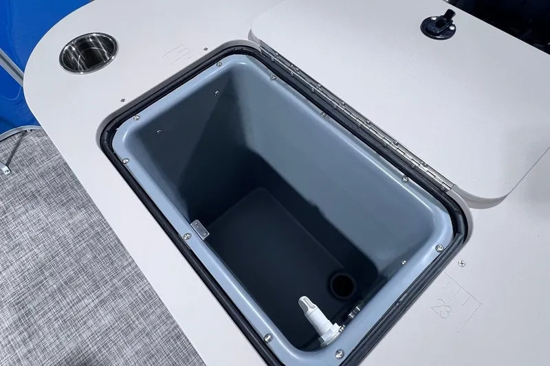 Slide: The Image of Open storage compartment in 2026 SunCatcher Select 20F boat interior. - 20