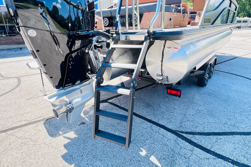 Slide: The Image of 2027 Harris Grand Mariner 250 SL pontoon boat with ladder and outboard motor. - 43