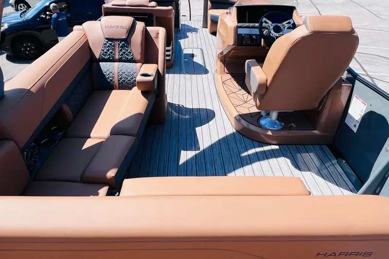 Slide: The Image of Luxurious interior of 2027 Harris Grand Mariner 250 SL pontoon boat with plush seating. - 10