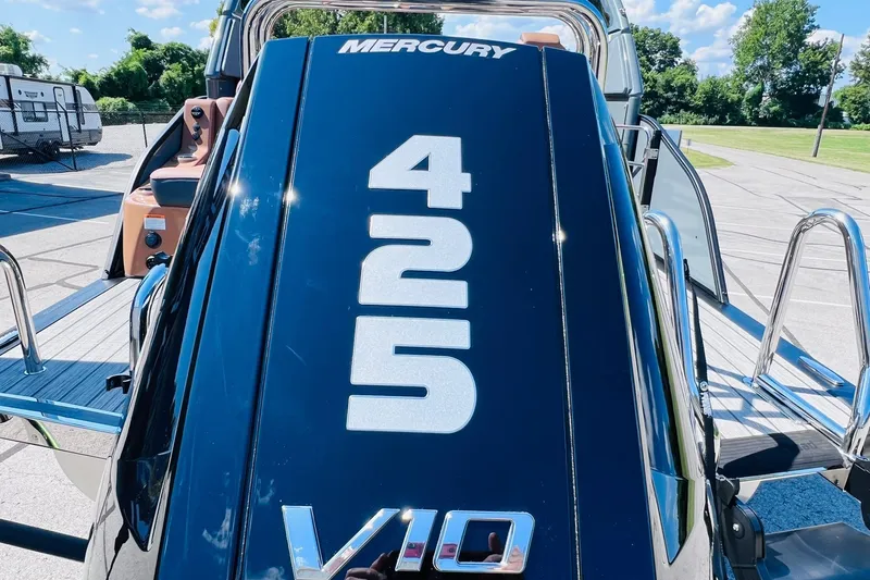 Slide: The Image of Mercury 425 V10 engine on 2027 Harris Grand Mariner 250 SL boat, sunny day. - 42