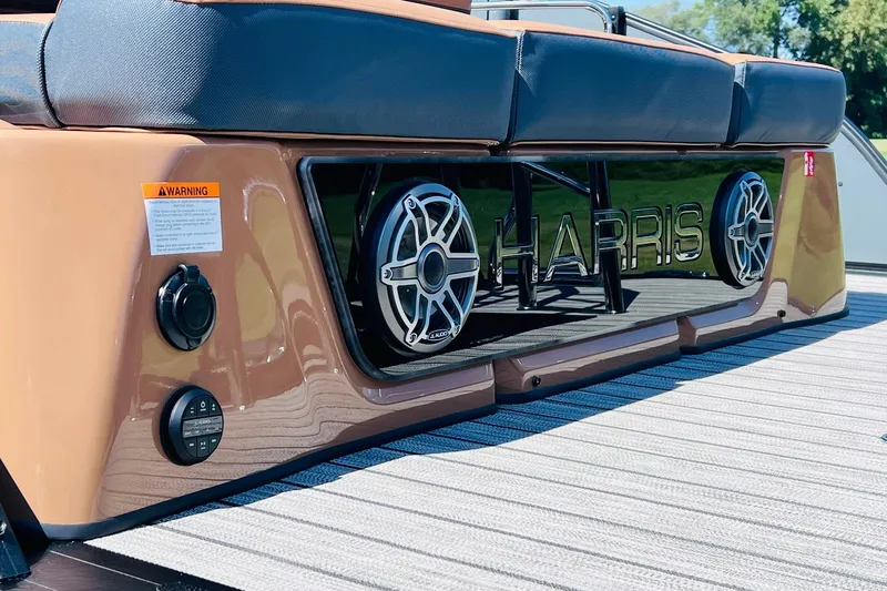 Slide: The Image of 2027 Harris Grand Mariner 250 SL boat with sleek design and premium audio system. - 39