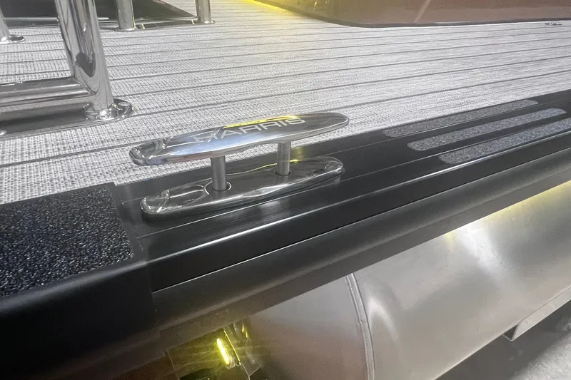 Slide: The Image of 2027 Harris Grand Mariner 250 SL boat deck with cleat and textured flooring. - 58