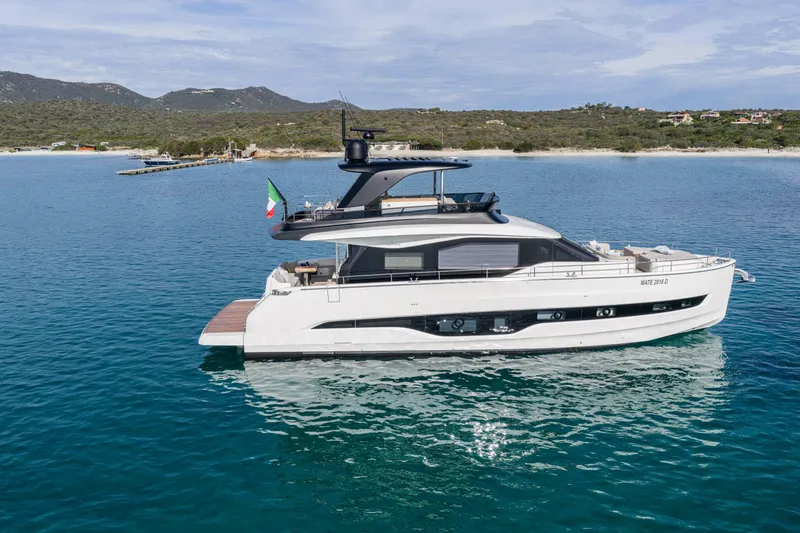 Slide: The Image of Luxury Cranchi Sessantadue 62 yacht, 2026 model, cruising in serene coastal waters. - 5