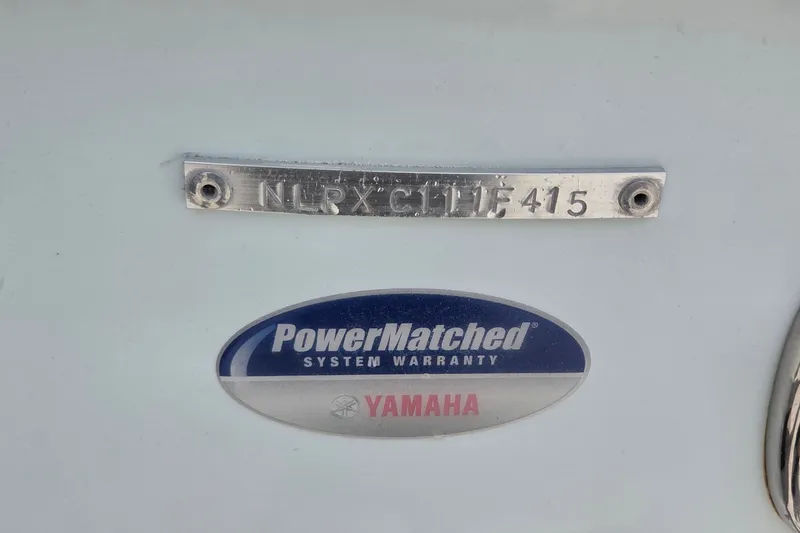 Slide: The Image of 2015 Tidewater 280 CC Adventure boat with Yamaha PowerMatched system warranty badge. - 23