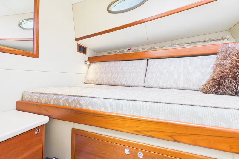 Slide: The Image of Luxurious interior cabin of 2018 Palm Beach Motor Yachts PB50 with elegant wood finish. - 22