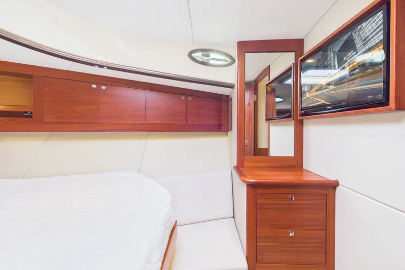 Slide: The Image of Luxurious 2018 Palm Beach Motor Yachts PB50 cabin with elegant wood cabinetry and modern decor. - 19