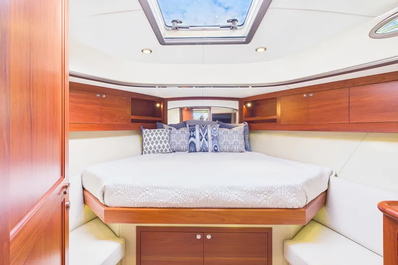 Slide: The Image of Luxurious cabin interior of 2018 Palm Beach Motor Yachts PB50 with elegant wood finish. - 17