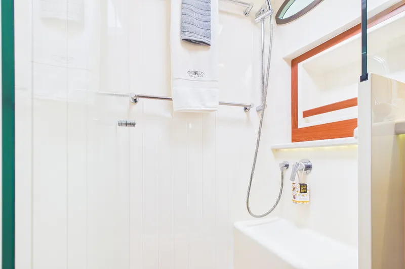 Slide: The Image of Luxurious bathroom in 2018 Palm Beach Motor Yachts PB50, featuring modern shower and elegant design. - 25