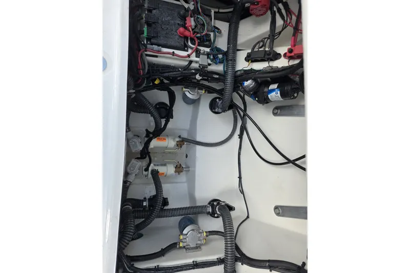 Slide: The Image of Engine compartment of 2027 Blazer Bay Makaira 2800 with wiring and components visible. - 12