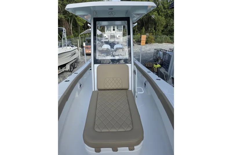 Slide: The Image of 2027 Blazer Bay Makaira 2800 boat interior with cushioned seating and sleek design. - 13