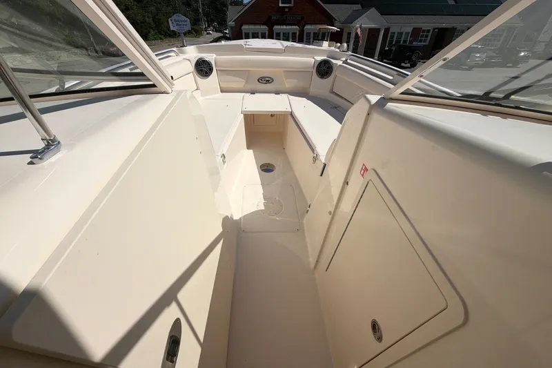 Slide: The Image of 2027 Grady-White Freedom 285 boat interior, showcasing spacious seating and sleek design. - 9