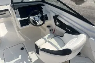 Slide: The Image of 2017 Sea Ray SPX 210 Outboard boat interior with sleek steering and comfortable seating. - 9