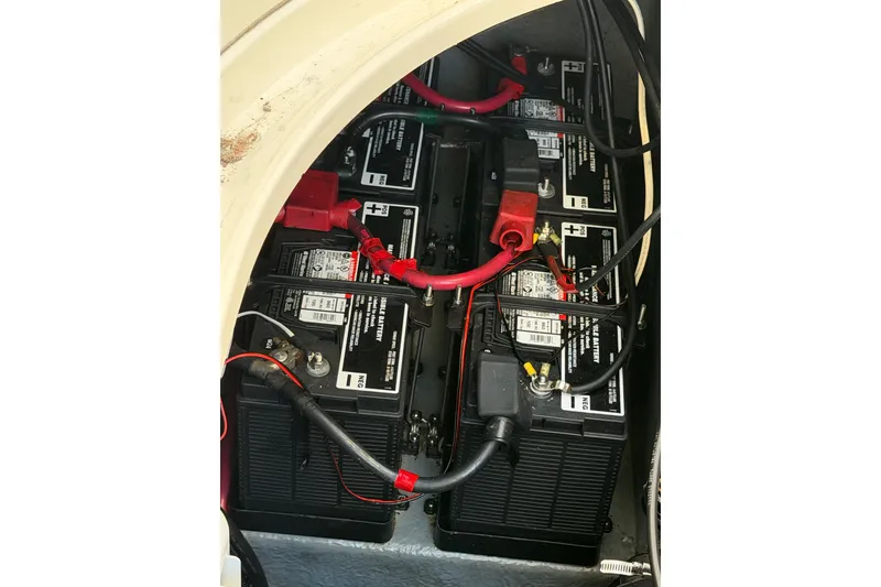 Slide: The Image of Batteries installed in a 2003 Sea Ray Sundancer 320 boat, showcasing wiring and connections. - 40