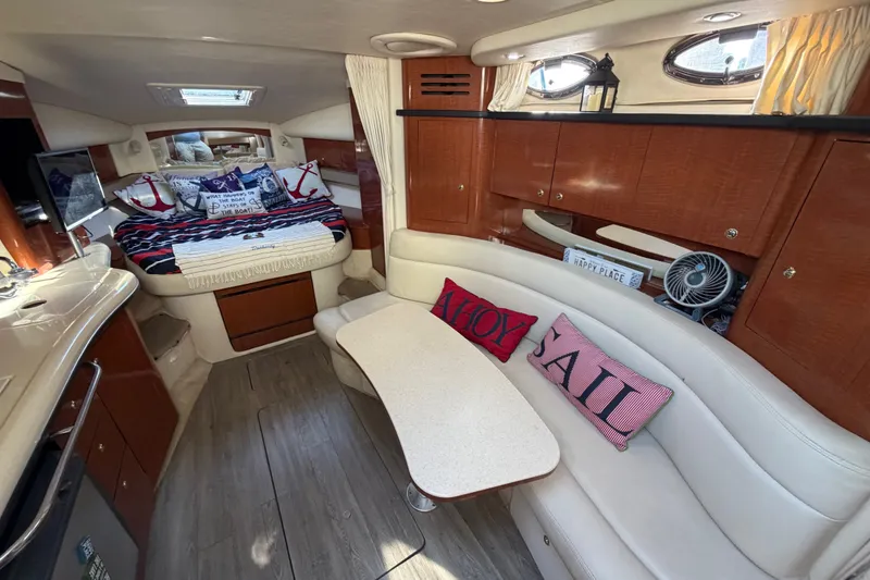 Slide: The Image of Interior of 2003 Sea Ray Sundancer 320 yacht with cozy seating and elegant wood finishes. - 22