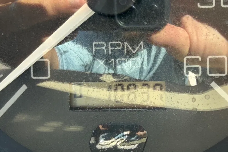 Slide: The Image of Close-up of a tachometer on a 2003 Sea Ray Sundancer 320 boat. - 16
